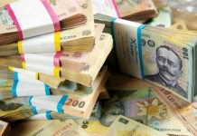 Firmele retrag bani din banci romanesti si ii plaseaza in sucursalele bancilor straine